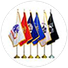 Indoor military parade set: branch flags on gold-topped poles with floor stands